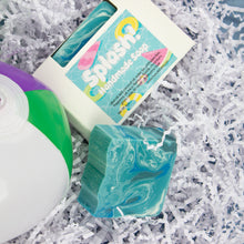 Load image into Gallery viewer, Bar of soap with a colorful label on a white textured background