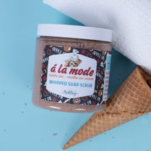 Load image into Gallery viewer, Jar of &#39;a la mode&#39; apple pie vanilla ice cream whipped soap scrub with waffle cone and towel on blue background