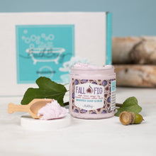 Load image into Gallery viewer, Jar of &#39;Fall Fig&#39; whipped soap scrub with a wooden scoop and leaves on a light surface.